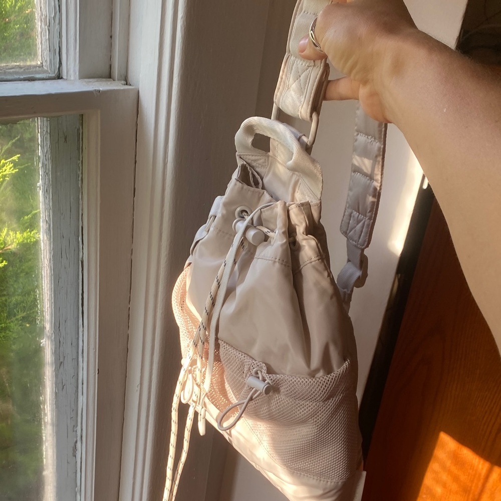 Dagne Dover Moonbeam Nova sling bag backpack cream